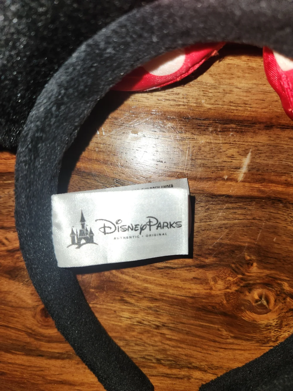 Disney Black Plush Minnie Ear Headband with Red Polka Dot Bow